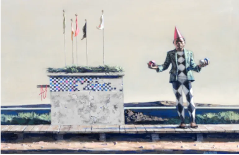 Jester in diamond-patterned outfit stands by a podium with flags, juggling under a clear sky.