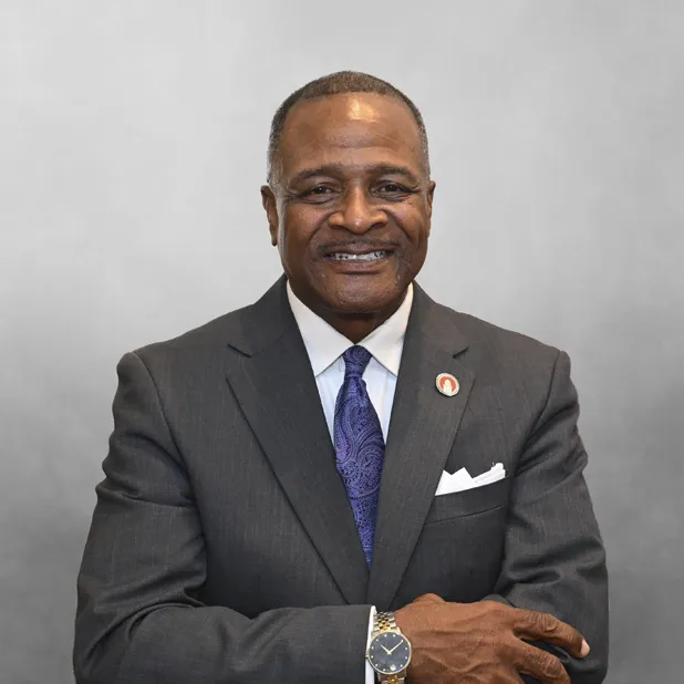 President George T. French, Jr. Phd. headshot December 2025 grey background