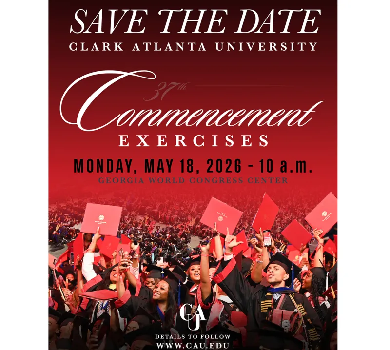 Graduates in caps and gowns celebrating at a commencement ceremony.