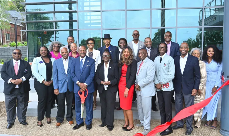 group shot in front of student success center
